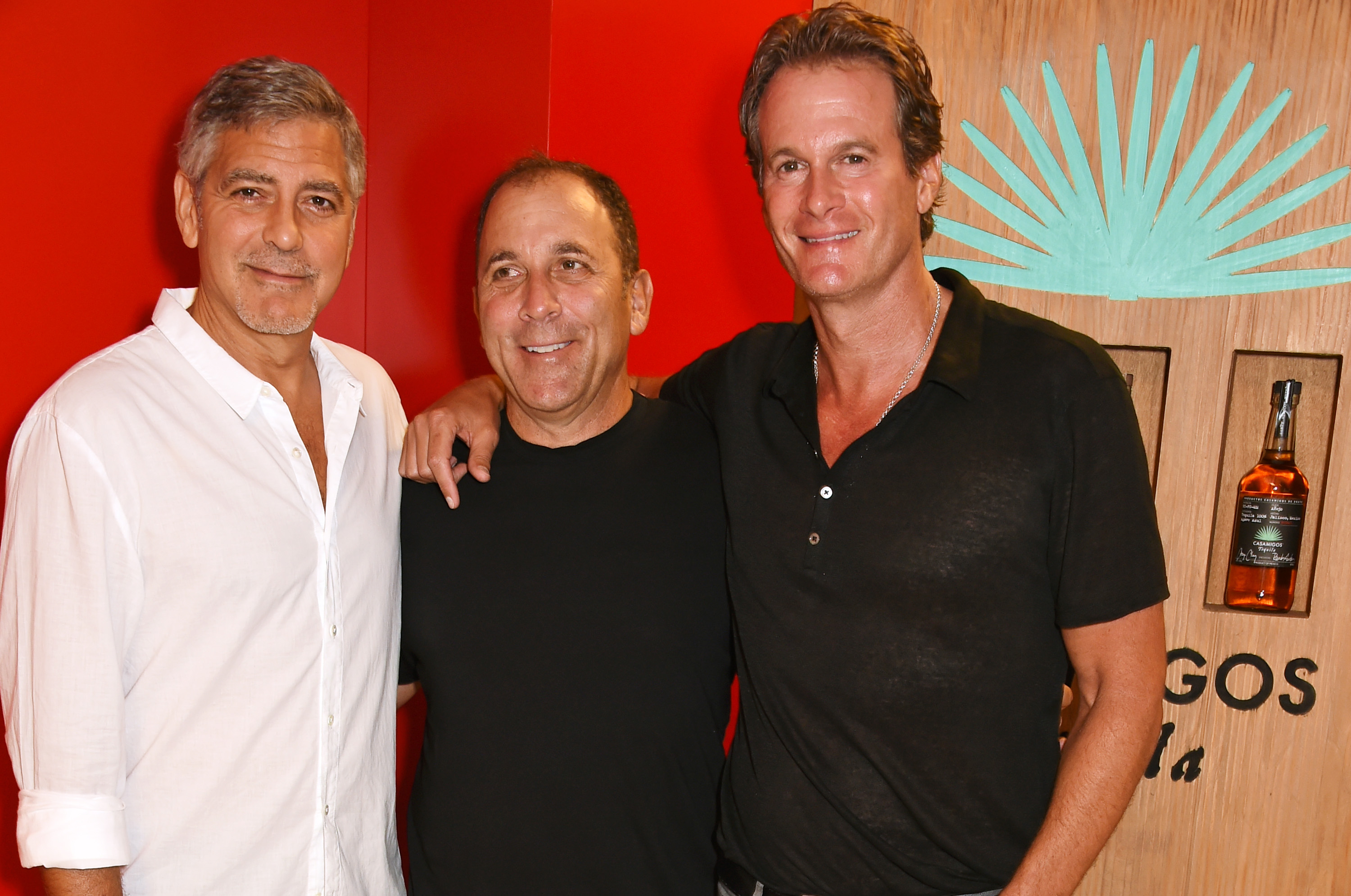 IBIZA, SPAIN - AUGUST 23: (L to R) Founders of Casamigos Tequila George Clooney, Mike Meldman and Rande Gerber attend as Casamigos founders Rande Gerber, George Clooney and Mike Meldman host the official launch of Casamigos Tequila in Ibiza and Spain at Ushuaia Ibiza Beach Hotel on August 23, 2015 in Ibiza, Spain. Pic Credit: Dave Benett