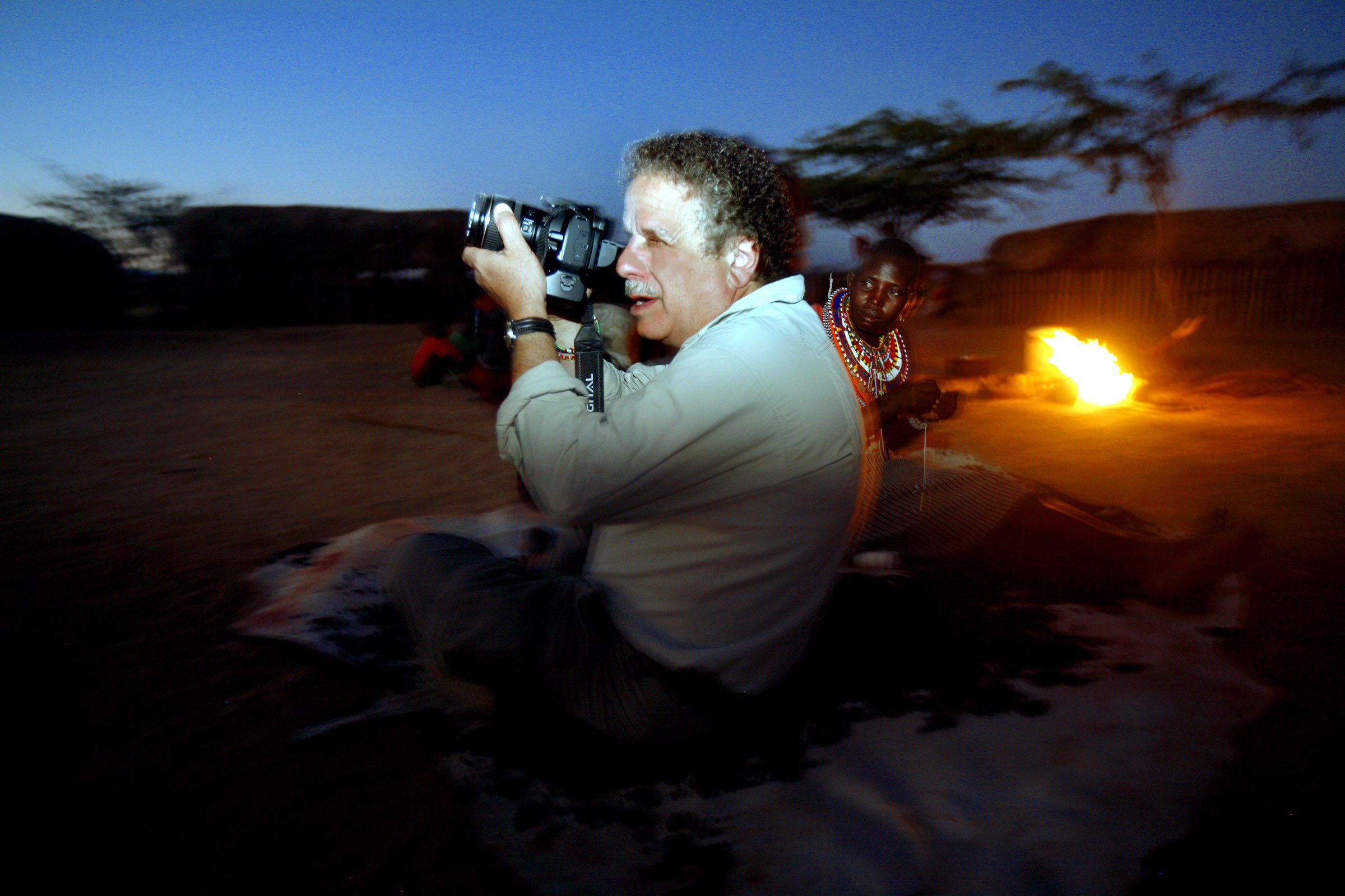 Lonnie on assignment in Kenya, in the Masai Mara - by Evelyn Hochstein